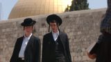 Ultra Orthdox boys on Tu' Be Av, walking in the Old City of Jerusalem